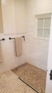 Glass shower with waterfall shower head