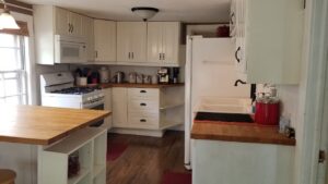 Ikea soft-close kitchen cabinets next to gas range