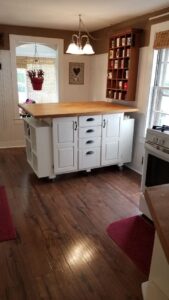 Bright kitchen with view to front porch