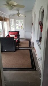 Coat closet and shoe storage by front door