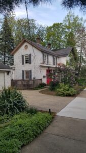 Two-story brick home with three bedrooms and two bathrooms